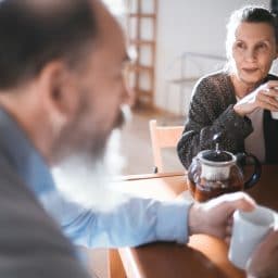 Older couple having breakfast together.